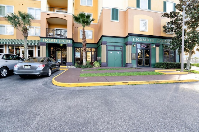 8100 Poinciana Blvd Unit 2501, Orlando, FL 32821 - view of building exterior featuring uncovered parking