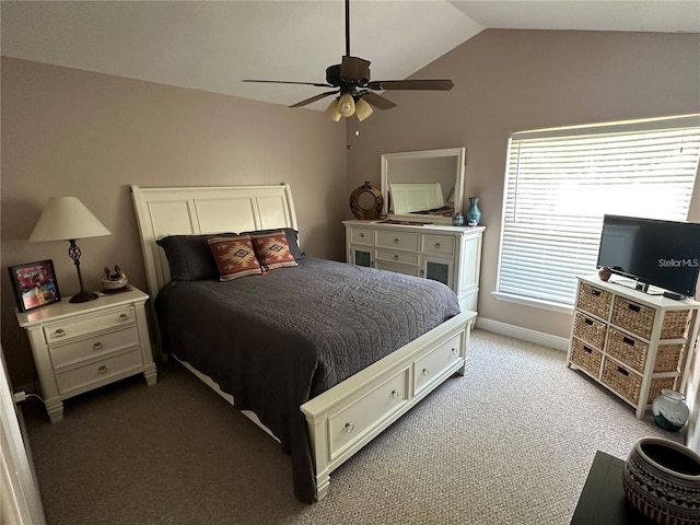 bedroom featuring ceiling fan, dark colored carpet, and vaulted ceiling