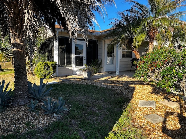 9319 SE 173rd Hyacinth St, The Villages, FL 32162 - exterior space with a yard