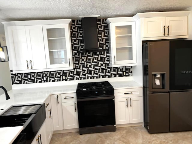 9319 SE 173rd Hyacinth St, The Villages, FL 32162 - kitchen with black appliances, light countertops, glass insert cabinets, and white cabinetry
