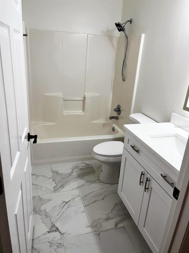 9319 SE 173rd Hyacinth St, The Villages, FL 32162 - bathroom featuring shower / bath combination, marble finish floor, toilet, and vanity