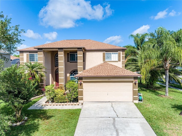 mediterranean / spanish-style house featuring a front lawn