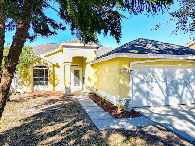 view of front of property featuring a garage