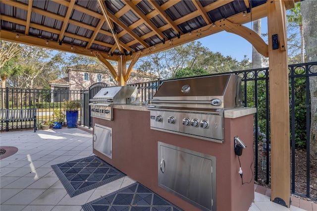 view of patio / terrace with a gazebo, a grill, area for grilling, and fence