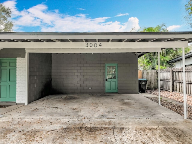 3004 Lake Margaret Dr, Orlando, FL 32806 - view of parking featuring an attached carport