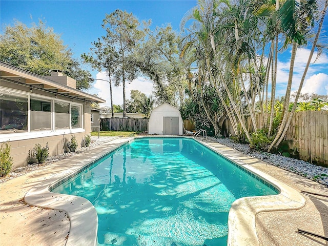 3004 Lake Margaret Dr, Orlando, FL 32806 - view of pool with a fenced backyard and a storage unit