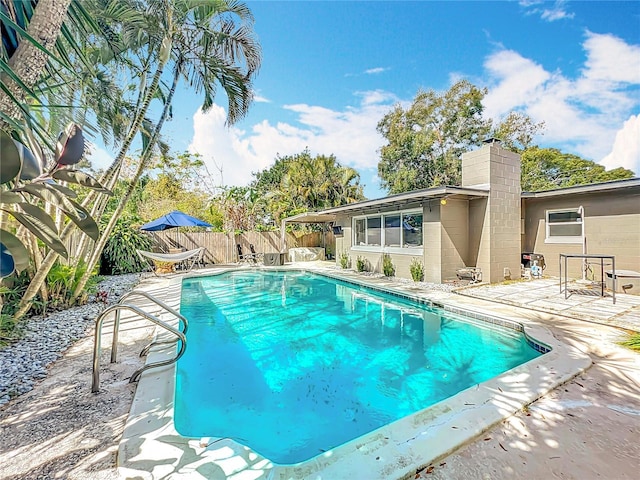 3004 Lake Margaret Dr, Orlando, FL 32806 - view of swimming pool with a patio area and a fenced backyard