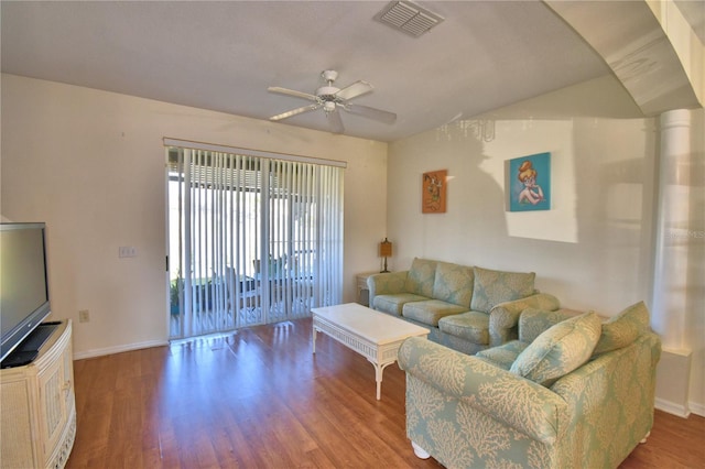 500 Monroe Cir, Davenport, FL 33896 - living room featuring a ceiling fan, baseboards, visible vents, and wood finished floors