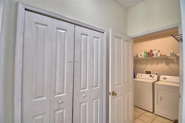 500 Monroe Cir, Davenport, FL 33896 - laundry area with laundry area, independent washer and dryer, and light tile patterned floors
