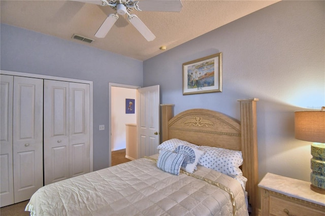 500 Monroe Cir, Davenport, FL 33896 - bedroom featuring a closet, ceiling fan, vaulted ceiling, and visible vents