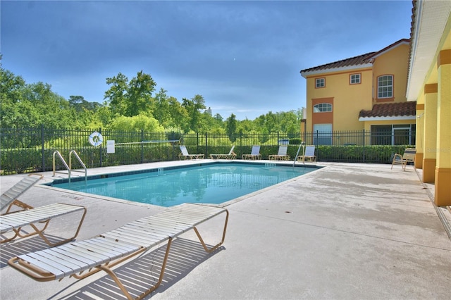 500 Monroe Cir, Davenport, FL 33896 - pool featuring fence and a patio area