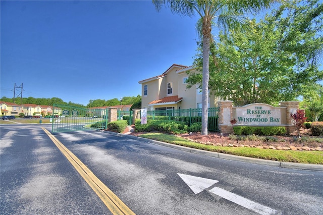 500 Monroe Cir, Davenport, FL 33896 - view of road with curbs and a gate