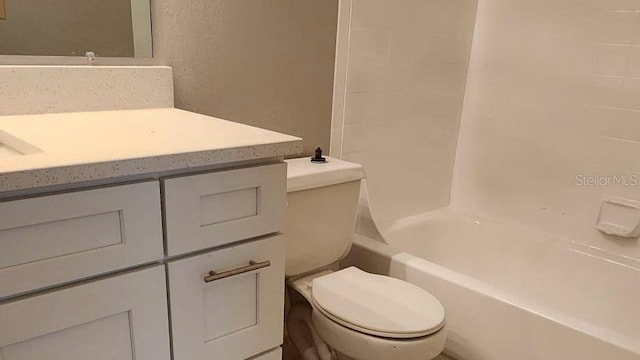 full bathroom with vanity, toilet, and tub / shower combination