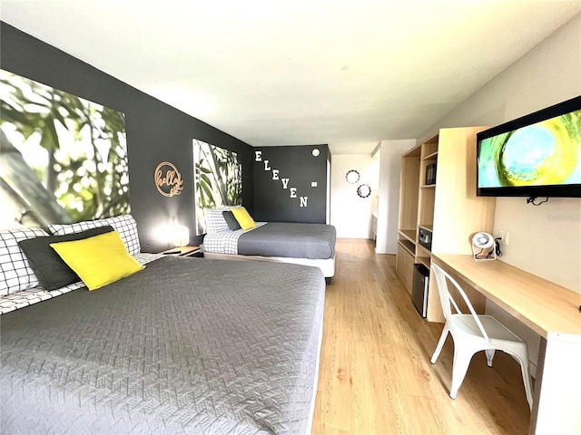 bedroom featuring light wood-style floors
