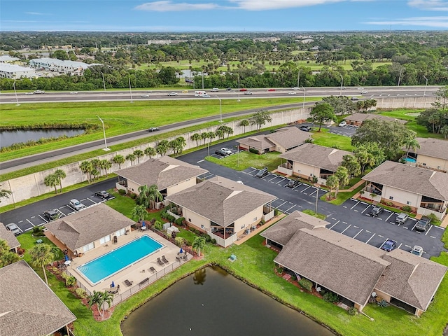 aerial view with a residential view and a water view