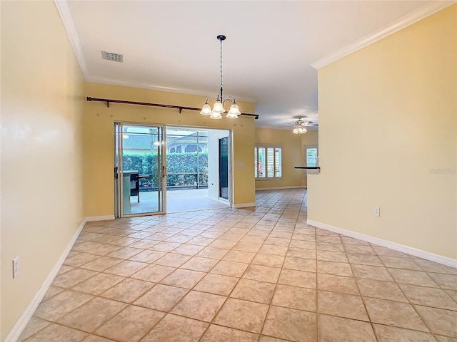 spare room featuring light tile patterned floors, baseboards, visible vents, and crown molding