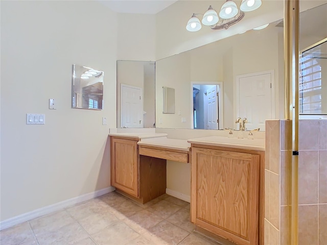 full bathroom featuring baseboards, vanity, and tile patterned floors