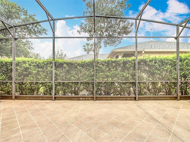 unfurnished sunroom with a wealth of natural light