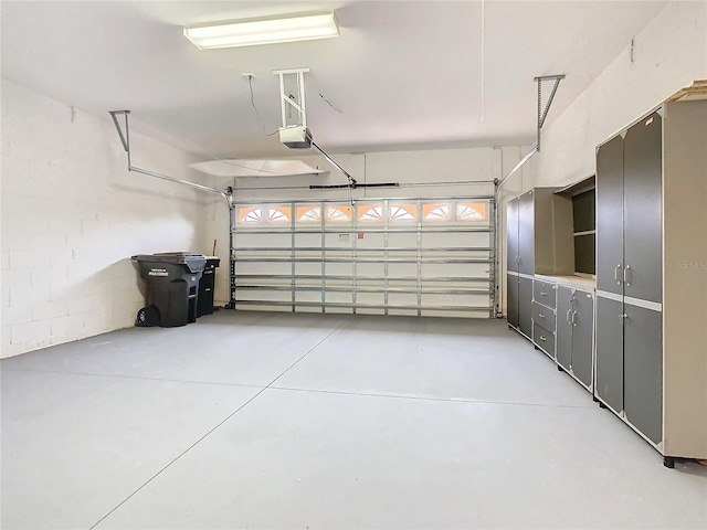 garage featuring a garage door opener