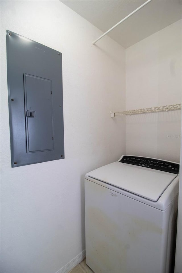 laundry room with washer / clothes dryer, electric panel, and laundry area