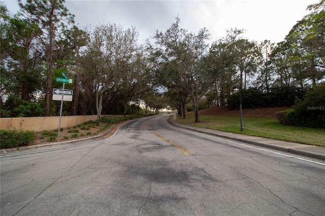 view of street featuring curbs and sidewalks