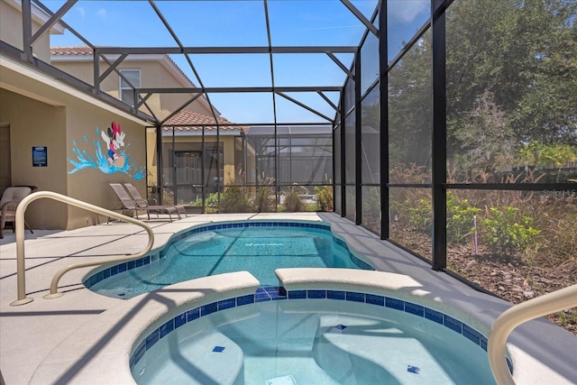 view of swimming pool with an in ground hot tub and a lanai