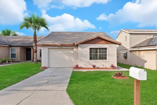 view of front facade with stucco siding, a front lawn, a garage, and driveway