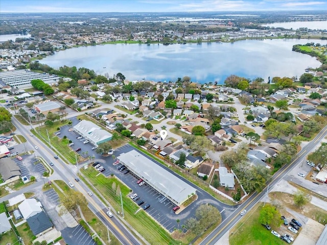 bird's eye view featuring a residential view and a water view