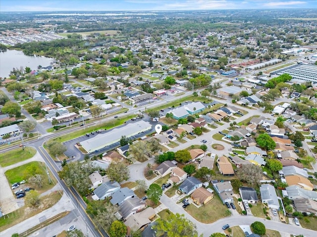 birds eye view of property featuring a residential view and a water view