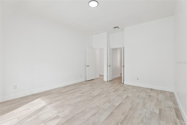 empty room featuring light hardwood / wood-style floors