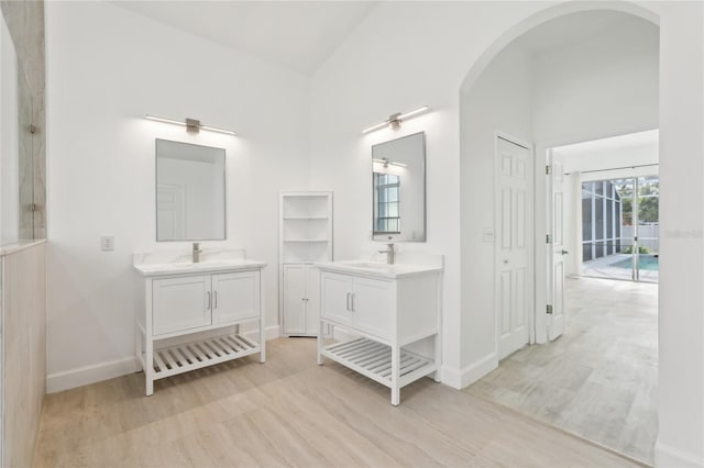bathroom featuring hardwood / wood-style flooring and vanity