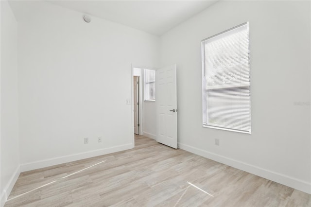 empty room with light wood-type flooring