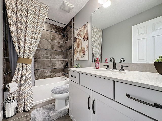 bathroom featuring a textured ceiling, toilet, vanity, visible vents, and shower / bath combo with shower curtain