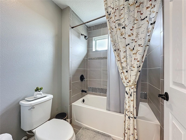 full bathroom featuring a textured ceiling, a textured wall, toilet, and shower / bathtub combination with curtain