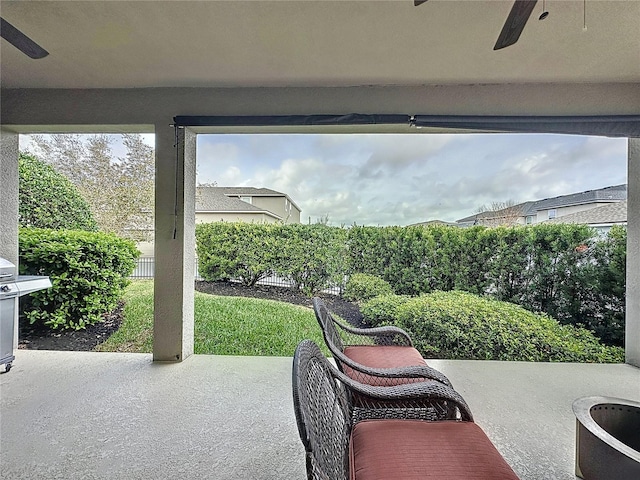 view of patio / terrace featuring a ceiling fan, fence, and area for grilling