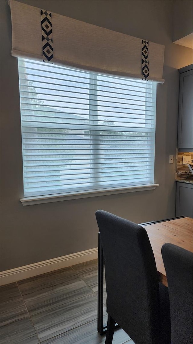 dining space with baseboards