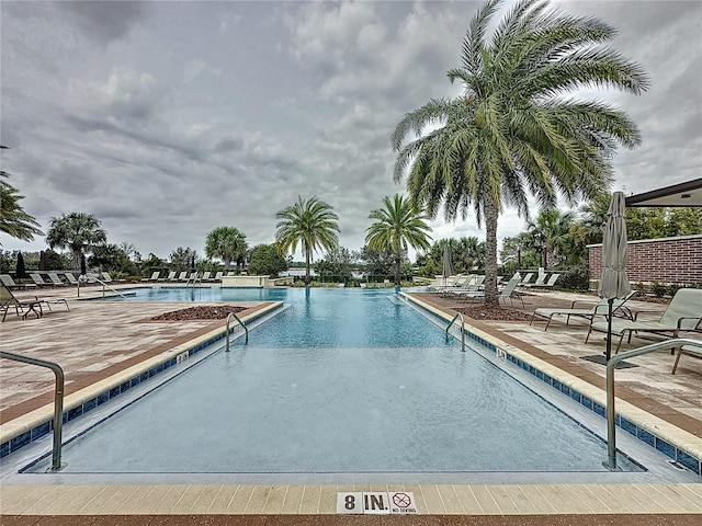 16150 Parkwyn St, Winter Garden, FL 34787 - community pool with a patio area