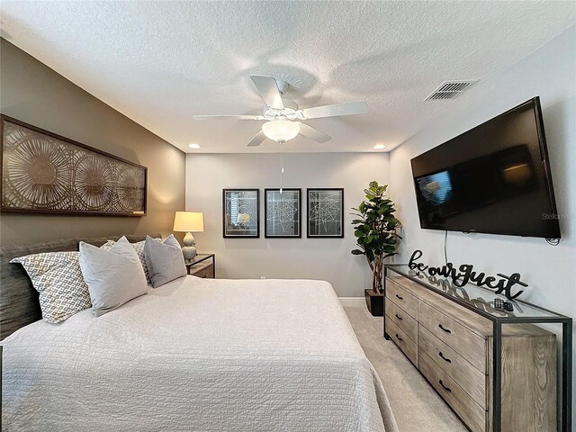 16150 Parkwyn St, Winter Garden, FL 34787 - bedroom with a ceiling fan, a textured ceiling, light colored carpet, visible vents, and recessed lighting