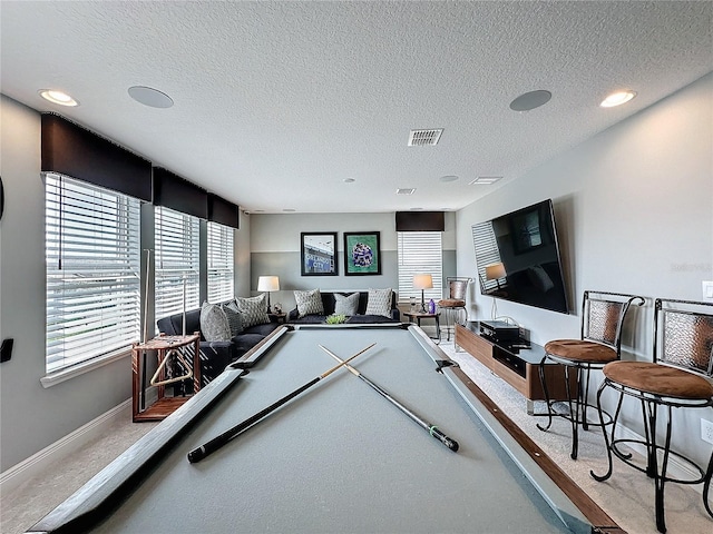 16150 Parkwyn St, Winter Garden, FL 34787 - rec room featuring a textured ceiling, carpet, baseboards, visible vents, and recessed lighting
