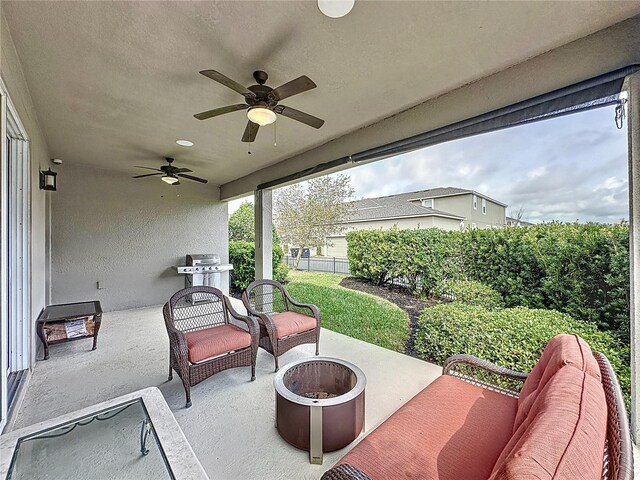 16150 Parkwyn St, Winter Garden, FL 34787 - view of patio featuring a fire pit, a ceiling fan, and fence
