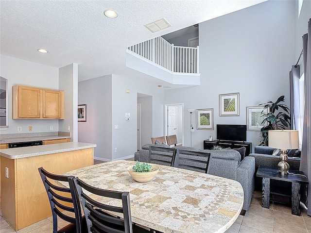 131 Stella Pass, Davenport, FL 33837 - dining space featuring light tile patterned floors, a textured ceiling, and recessed lighting