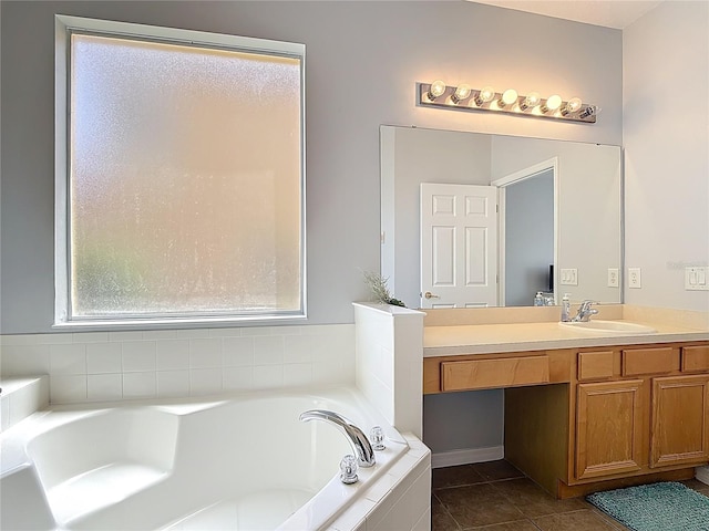 131 Stella Pass, Davenport, FL 33837 - full bath with vanity, a garden tub, and tile patterned flooring