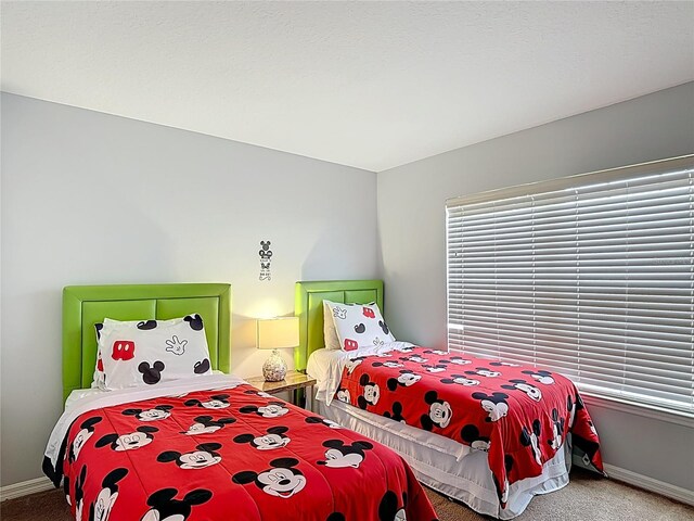 131 Stella Pass, Davenport, FL 33837 - bedroom with carpet floors and baseboards