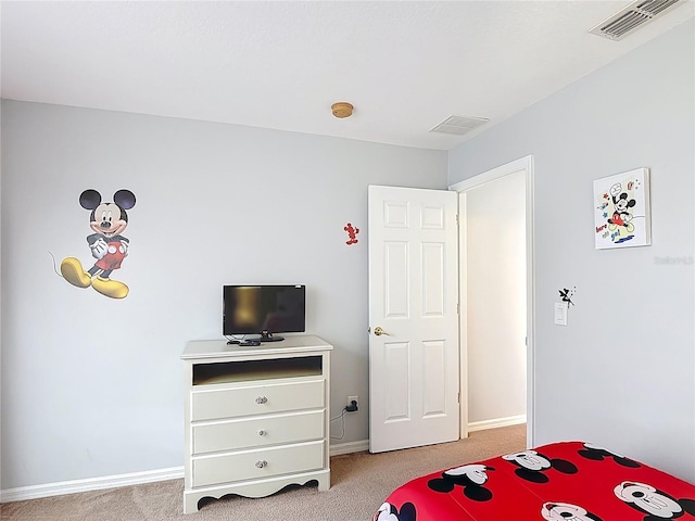 131 Stella Pass, Davenport, FL 33837 - bedroom featuring light colored carpet and baseboards