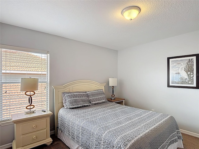 131 Stella Pass, Davenport, FL 33837 - bedroom with dark colored carpet and baseboards