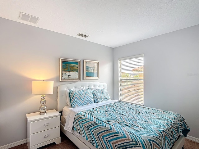 131 Stella Pass, Davenport, FL 33837 - bedroom with dark colored carpet and baseboards
