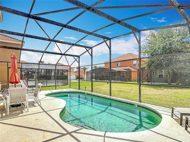 131 Stella Pass, Davenport, FL 33837 - outdoor pool featuring a patio, a yard, a residential view, and glass enclosure