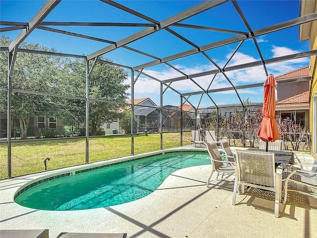 131 Stella Pass, Davenport, FL 33837 - outdoor pool with a patio area, a yard, and glass enclosure