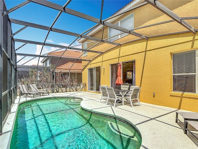 131 Stella Pass, Davenport, FL 33837 - outdoor pool featuring a patio area and a lanai
