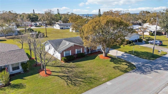 drone / aerial view with a residential view